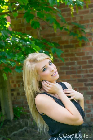 Busty-blonde-gets-naked-outdoors-03