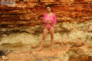 20-girl-in-the-rocks-shows-her-big-boobs