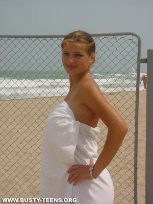 04-teen-shows-her-huge-jugs-on-the-beach