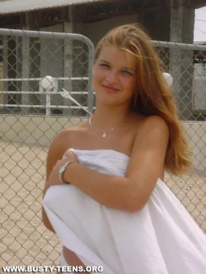 06-teen-shows-her-huge-jugs-on-the-beach